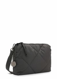 Quilted black nylon bag with a zip closure, chain and fabric strap, and a round tag. Features a diamond pattern and a smooth texture.