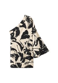 Top beige asymétrique avec manche large évasée et motif feuilles tropicales noires.