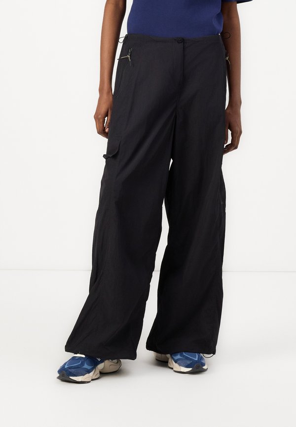 PARACHUTE PANTS - Trousers