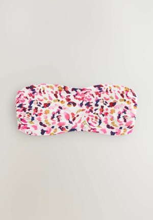 Haut de bikini bandeau sans bretelles avec un motif floral abstrait vibrant en rose, rouge, bleu marine et moutarde sur fond blanc.