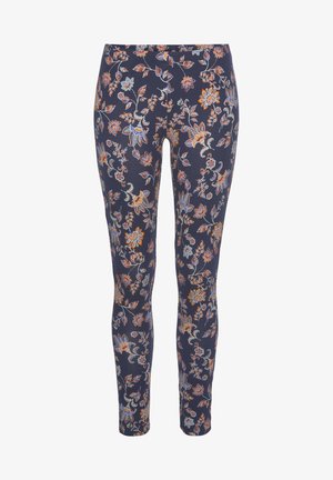 Kaitinātas jūras spēku legingi ar ziedu rakstu oranžā, zilā un baltā krāsā; izgatavoti no elastīga materiāla ar pieguļošu dizainu.