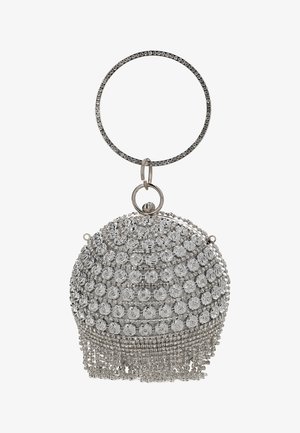 Hopeinen käsilaukku, jossa on pyöreä muotoilu ja joka on koristeltu spiraalikuvioilla sekä metallisilla hapsuilla. Laukussa on ympyränmuotoinen strassikahva.