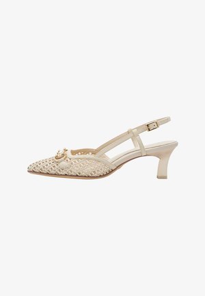 Beige slingback heel with a pointed toe, woven texture, and decorative gold hardware. Features a mid-height heel and adjustable strap.