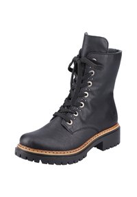 Bottines en cuir noir avec bout rond, lacets à l'avant, œillets en argent et semelle texturée. Une bordure cousue le long de la plateforme ajoute du détail.