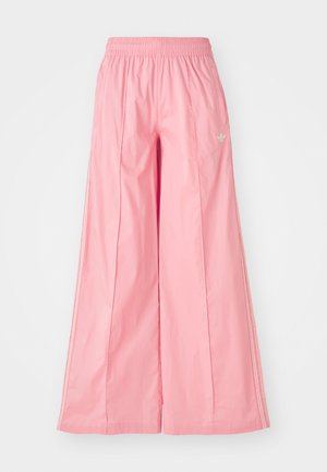 Pink wide-leg pants made of lightweight fabric, featuring an elastic waistband and subtle white side stripes. Small logo on the front.
