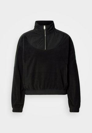 Pullover preto de meio zíper com gola alta, mangas longas, punhos elásticos e bolsos laterais, exibido contra um fundo branco simples.