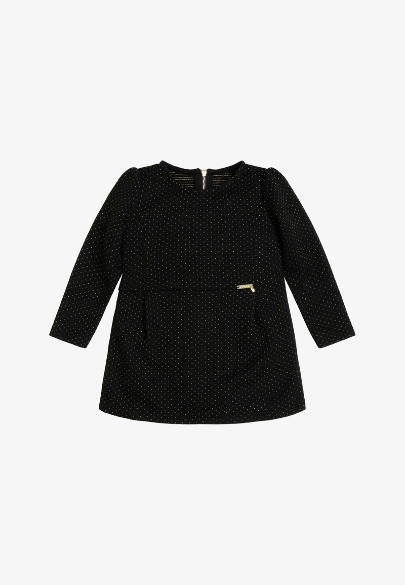 Czarna sukienka z długim rękawem, w złote kropki, okrągły dekolt i zamek z tyłu. Posiada małą boczną kieszeń oraz gładką fakturę.