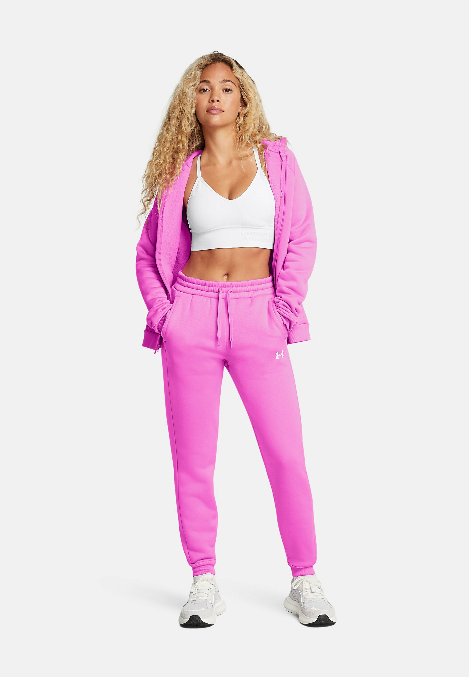 Under Armour JOGGER - Tracksuit bottoms - vivid magenta
