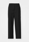 TAMANIA - Pantaloni - black