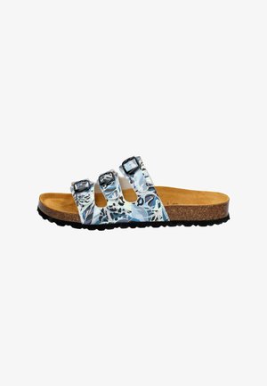 White and blue floral patterned sandal with three adjustable black buckles, cork midsole, and textured black rubber outsole.