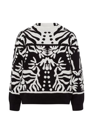 Pull à motifs noir et blanc avec un col rond, présentant des motifs floraux abstraits et des motifs animaliers, manches longues et ourlet côtelé.