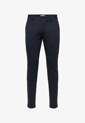 Navyblå bukser med smal pasform, lavet af blødt materiale. Har en knaplukning og bæltestropper, med en glat tekstur hele vejen igennem.