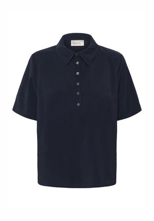 Camisa de manga corta azul marino hecha de tela suave, con cuello clásico y cierre frontal con botones decorativos metálicos.