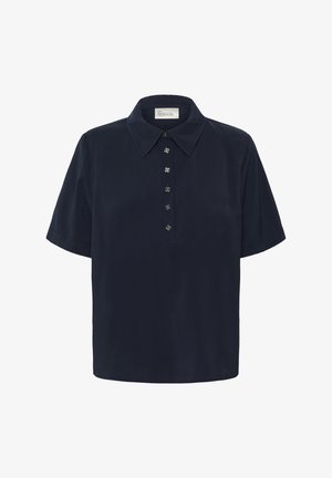 Camisa de manga corta azul marino hecha de tela suave, con cuello clásico y cierre frontal con botones decorativos metálicos.