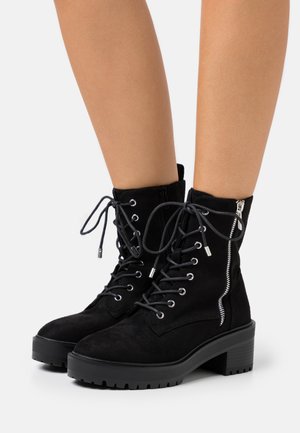 Platform ankle boots - black