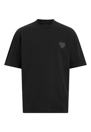 Sort bomulds T-shirt med rund hals og korte ærmer, med et lille hjerteformet design på venstre brystområde.