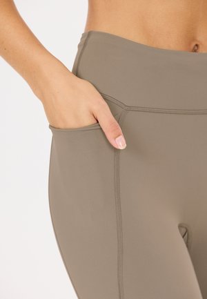 Athlecia, ATHLECIA TIGHTS ALIYA V2 - Tights - greige