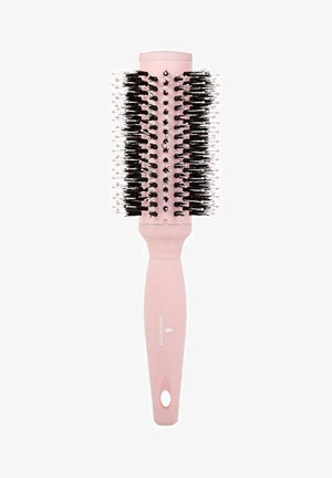 Round hairbrush with a pink plastic handle and a cylinder-shaped head featuring black bristles and pink tips, designed for styling hair.