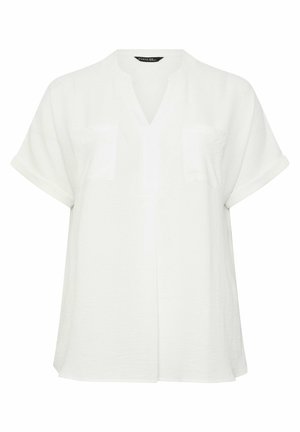Blouse blanche à manches courtes avec col en V et deux poches poitrine à l'avant, coupe ample, en tissu léger.