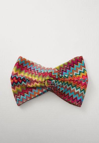 Mehrfarbiger Stoff-Haarreif mit einem Zickzackmuster in Pink, Blau, Grün und Gold. Weiche Textur mit einem geknoteten Mittelteil.