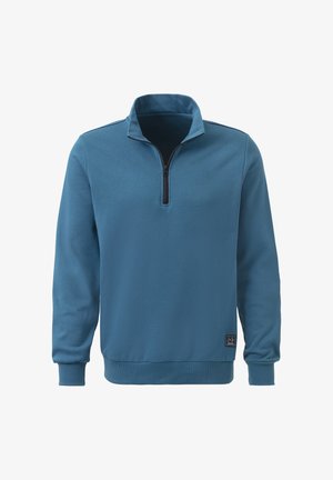 Helles blauer Fleece-Pullover mit Viertel-Reißverschluss, Rippbündchen und -saum. Mit einem gewebten Logopatch auf der unteren linken Seite. Weiche Textur.