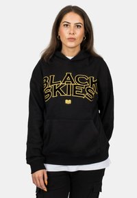 Black hoodie featuring bold yellow lettering “BLACK SKIES.” Made of cotton, it has a front pocket and ribbed cuffs at the hem for fit.
