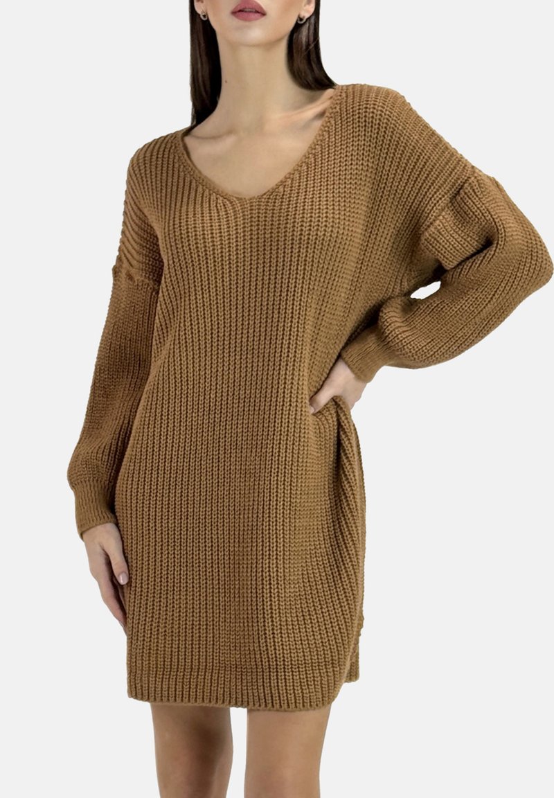 Knit sweater dress in a warm brown hue, featuring a V-neck, long sleeves, and a relaxed fit with side pockets. Textured ribbed fabric.