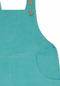 Türkisfarbene Corduroy-Latzhose mit zwei Holzknöpfen an den Trägern, ausgestattet mit einer Vordertasche und einer glatten Textur.