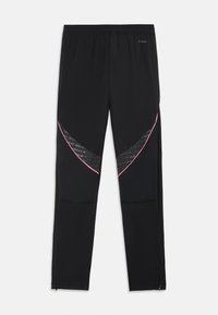 Zwarte sportbroeken met een taps toelopend design, voorzien van mesh accenten en roze paspels langs de zijnaad. Elastische tailleband en ritsen bij de enkels.