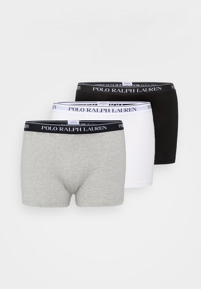 Kokvilnas bokseršorti pelēkā, baltā un melnā krāsā ar elastīgām jostasvietām, uz kurām ir zīmols "POLO RALPH LAUREN". Gluda tekstūra, taisns griezums.