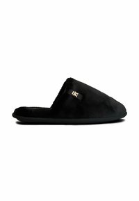 Zapatilla negra con parte superior de tela suave, parte trasera abierta, suela acolchada y un pequeño logotipo en el lado. Textura suave, diseño minimalista.
