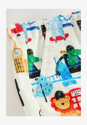 Tkanina z barvnimi motivi živali in mest, vključno z zelenim krokodilom, rdečimi avtobusi, uro na stolpu in levom, z elastičnim pasom.