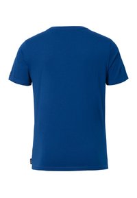Camiseta azul de manga corta hecha de algodón. Presenta un cuello redondo y una pequeña etiqueta en el lado izquierdo. Textura suave, diseño sencillo.