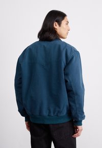 Carhartt WIP SANTA FE JACKET - Light jacket - deep lagoon/black