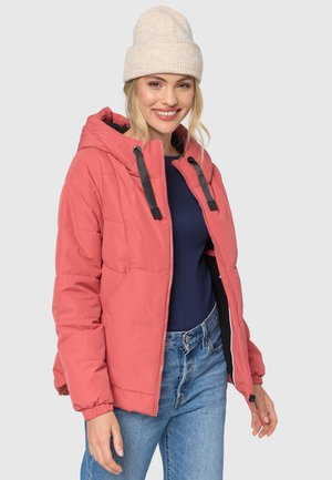 Pink puffer jacket with a hood, featuring black drawstrings and side pockets. Worn over a navy top, paired with light blue jeans.