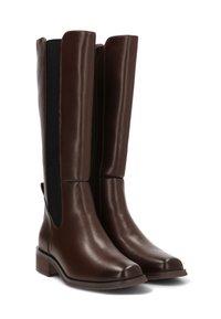 Botas de cuero marrón hasta la rodilla con un acabado suave y paneles laterales elásticos. Punta redonda y un tacón de bloque modesto para mayor estabilidad.