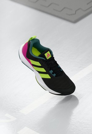 Black athletic shoe with a textured upper, featuring neon green and pink accents, turquoise lining, and three white stripes on the side.