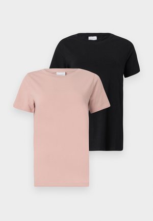 Two round-neck t-shirts: one in light pink and one in black. Short sleeves, solid colors, cotton material, casual fit.
