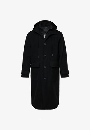Lang sort hættejakke med knaplukning, to forlommer med klap og lynlåsgardin, designet til koldt vejr.