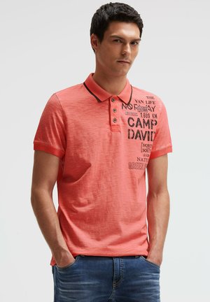 MIT VINTAGE PRINTS - Polo shirt - wild salmon