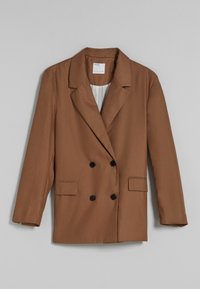 Hnědý dvouřadý blejzr z hladké tkaniny. Má dvě přední kapsy, černé knoflíky a klopový límec s výřezem.