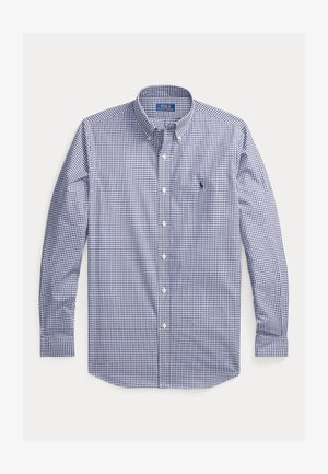 Camisa de hombre de manga larga de botones en cuadros gales azul marino y blanco. Presenta un cuello clásico, tapeta de botones y un logo bordado.