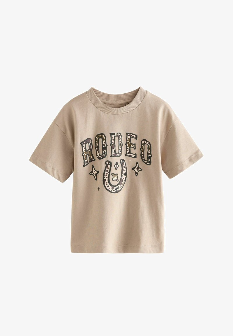 Beige short-sleeve T-shirt with ribbed collar, featuring the word "RODEO" in leopard print letters and a horseshoe graphic with stars.