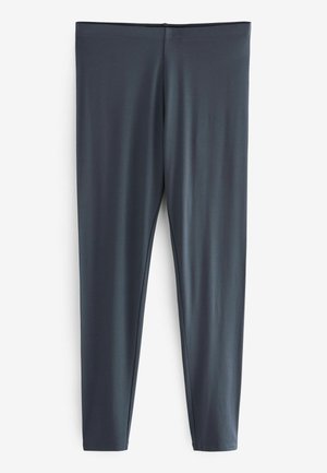 Grå leggings gjorda av ett slätt, elastiskt tyg. Har en åtsittande design med hög midja och ankellång nederkant. Ingen synlig märkning eller mönster.