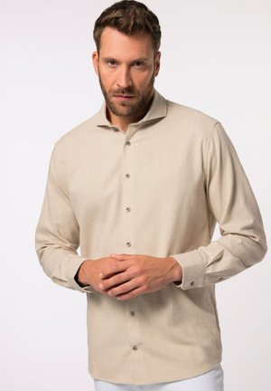Beige Langarmhemd aus texturiertem Stoff, mit Knopfleiste und klassischem Kragen sowie Knöpfen an den Manschetten. Minimalistisches Design.