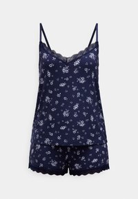 Ensemble de pyjama à motif floral bleu marine comprenant un haut sans manches avec bordure en dentelle et un short assorti aux bords festonnés. Texture de tissu douce.