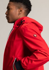 Wellensteyn Regenjacke / wasserabweisende Jacke - rot