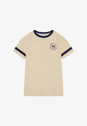 Beige T-shirt med korte ærmer, navy krave, navy striber på ærmerne og cirkulær "Smile Everyday" tekst med smilende ansigt på brystet.