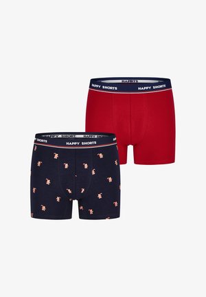 Deux paires de boxers en coton : l'une rouge et l'autre marine avec un petit motif de bonhommes en pain d'épice, toutes deux avec une ceinture "HAPPY SHORTS".