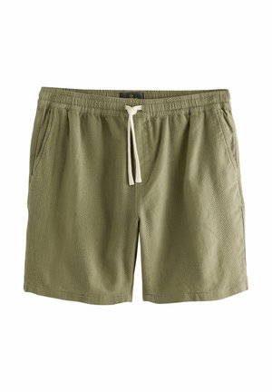 Pantalones cortos verde oliva hechos de tejido texturizado, con una cintura elástica, cordón y bolsillos laterales. Diseño simple sin patrones.